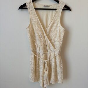 American Eagle Outfitters Lace Surplice Romper in Cream
